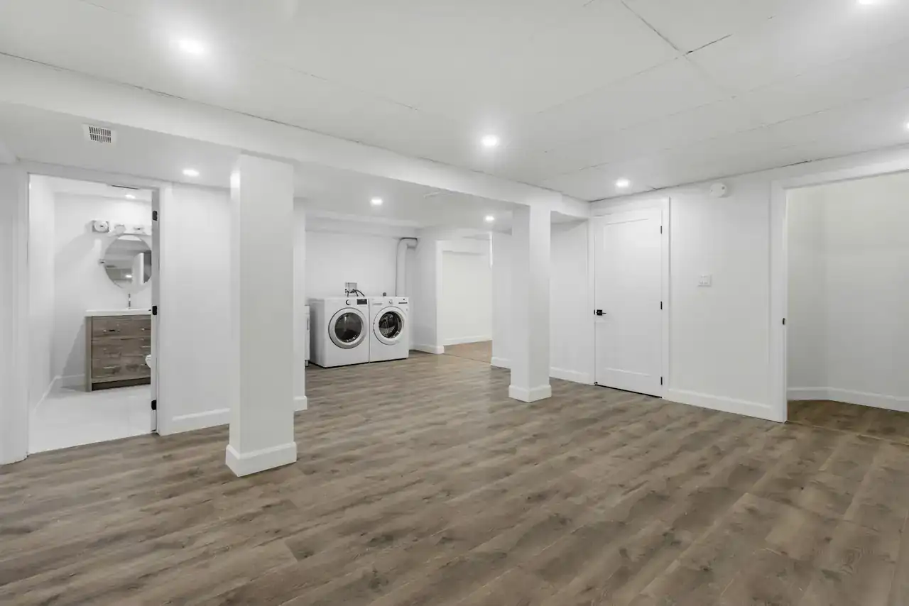 Finished basement with laundry and a bathroom